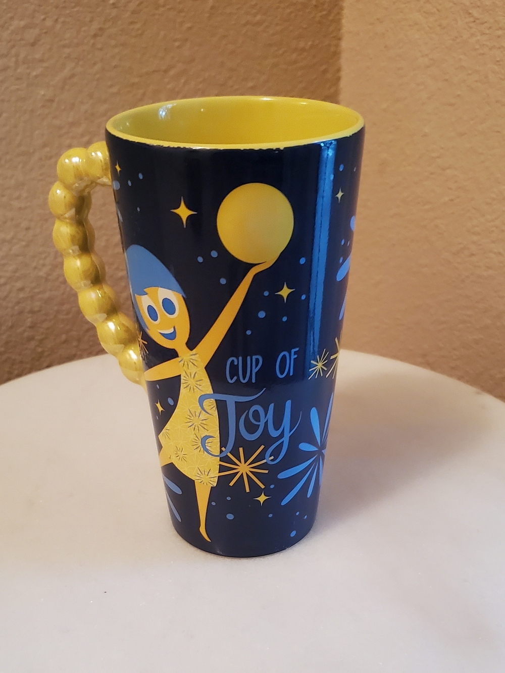 Disney "Cup of Joy" Yellow & Blue With An Iridescent Yellow Beaded Handle 6x3"